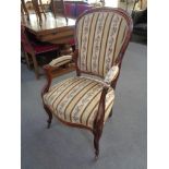 A continental armchair in tapestry fabric