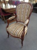 A continental armchair in tapestry fabric