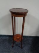 A Victorian inlaid mahogany two tier plant stand