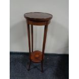 A Victorian inlaid mahogany two tier plant stand