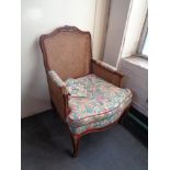 A bergere backed armchair