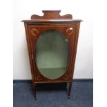 A Victorian inlaid mahogany display cabinet on tapered legs