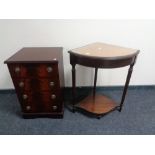 A mahogany audio cabinet together with a glass topped corner table with leather inset panel