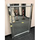 A contemporary all glass mirror,