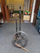 An ebonised spinning wheel