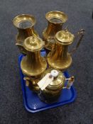 Tray of three brass teapots and a pair of brass and embossed vases