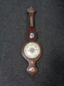 An early 20th century mahogany aneroid banjo barometer.