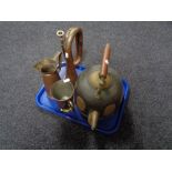 A tray of an Eastern brass and copper teapot, brass and copper tankard,