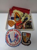 A box of vintage Cub Scout neckerchief and belt,