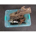 A box of vintage wood working planes, hand pull beer pump,