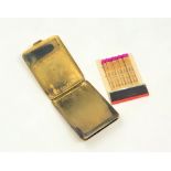 A 9ct gold match holder, the hinged lid engraved "W.S.R" and the inside engraved "13.12.33 From M.C.