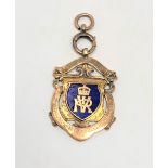 A 15ct gold enamelled Newcastle Upon Tyne Infirmary Sports medal CONDITION REPORT: