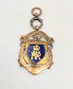 A 15ct gold enamelled Newcastle Upon Tyne Infirmary Sports medal CONDITION REPORT: