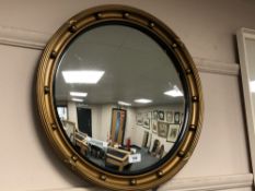 A convex porthole mirror, diameter 55 cm.