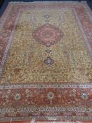 A large Kirman carpet of floral Tree of Life design, signed,