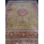 A large Kirman carpet of floral Tree of Life design, signed,