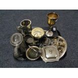 A tray of twentieth century plated wares, part tea service, napkin rings, goblet, cased servers,