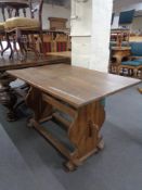 A 20th century pine refectory dining table