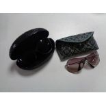 A set of cased lady's sunglasses - Rayban and Guess