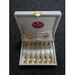 A boxed set of Royal Albert Old Country Roses gold plated tea spoons