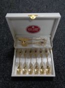 A boxed set of Royal Albert Old Country Roses gold plated tea spoons