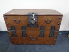 A Korean elm metal bound chest CONDITION REPORT: This is late 19th century.