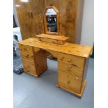 A pine twin pedestal dressing table