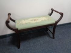 An early 20th century dressing table stool