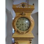 An antique continental painted longcase clock with pendulum and weights