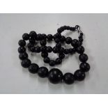 A Whitby Jet beaded necklace CONDITION REPORT: 90cm long. Clasp a/f.