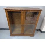 An oak double door bookcase