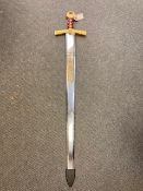 A gilt handled ornamental sword