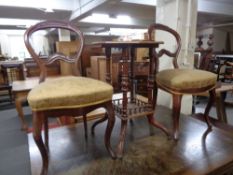 A pair of antique mahogany balloon back chairs together with a hexagonal occasional table