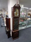 A Tempus Fugit longcase clock with pendulum and weights