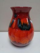 A Poole pottery glazed vase, height 21.