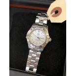 A TAG Heuer lady's wrist watch, model MX 7114 SS Aquaracer BW, stainless steel bracelet,
