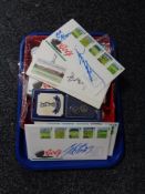 A tray of golf balls, signed gold ball, first day covers relating to golf,