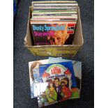 A box of vinyl LP records : world music, Nat King Cole,