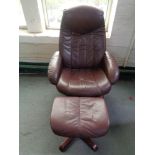 A brown leather relaxer chair and stool