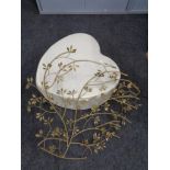 A Next heart shaped footstool and a piece of metal wall art