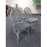 Four painted oak wheel back chairs