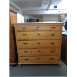 A 19th century pine five drawer chest with metal drop handles CONDITION REPORT: