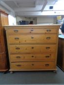 A 19th century pine five drawer chest with metal drop handles CONDITION REPORT: