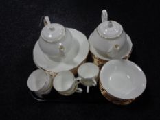 An extensive Duchess White and Gilt tea and dinner service