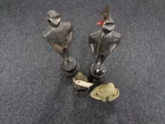 Three metal figures on bases,