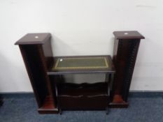 Two reproduction mahogany CD and cassette stands and a magazine rack