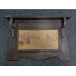 An early 20th century continental oak panel depicting figures on a dock side