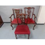 Two Victorian mahogany Hepplewhite style chairs, plus one other.