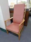 A mid 20th century Danish teak framed armchair