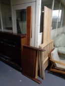 A mid 20th century teak 3' bed frame